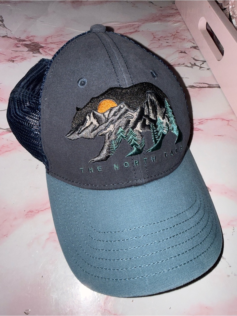 The North Face Two-Tone Blue Gray Trucker Hat with Mountain Bear Patch